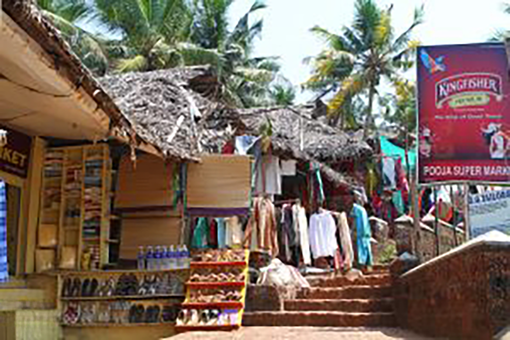 A Tibetan market lining a cliff side overlooking the ocean in Varkala, India