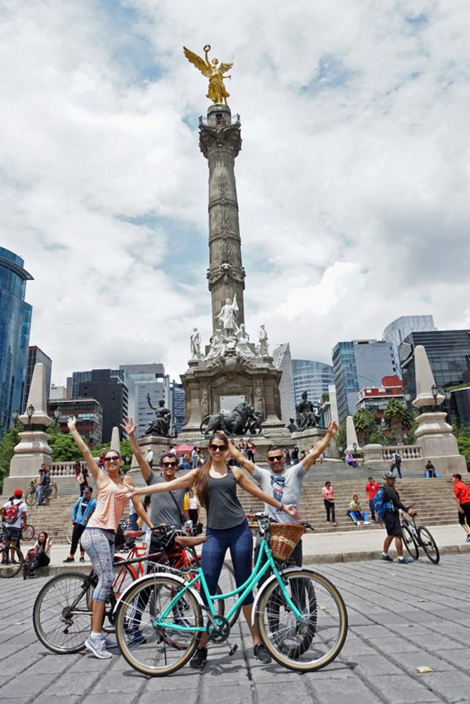 Biking in front of the Angel of Independence in Mexico City