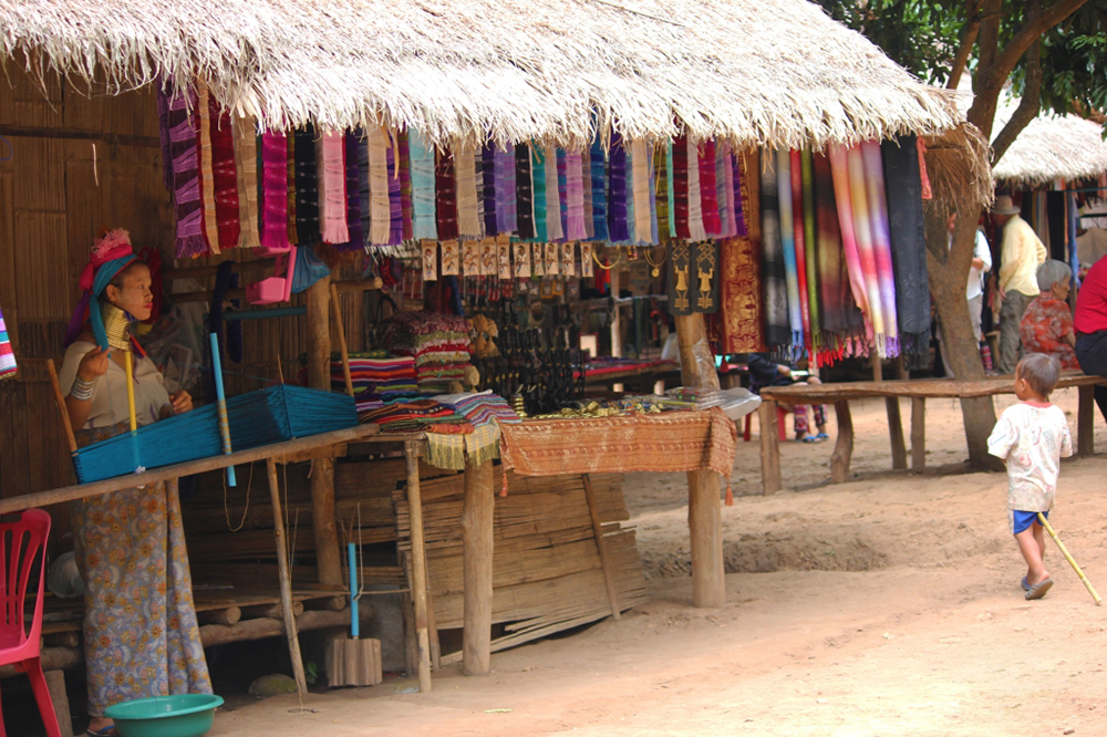 Karen Long-Neck Hilltribes selling hand-woven fabrics in Thailand