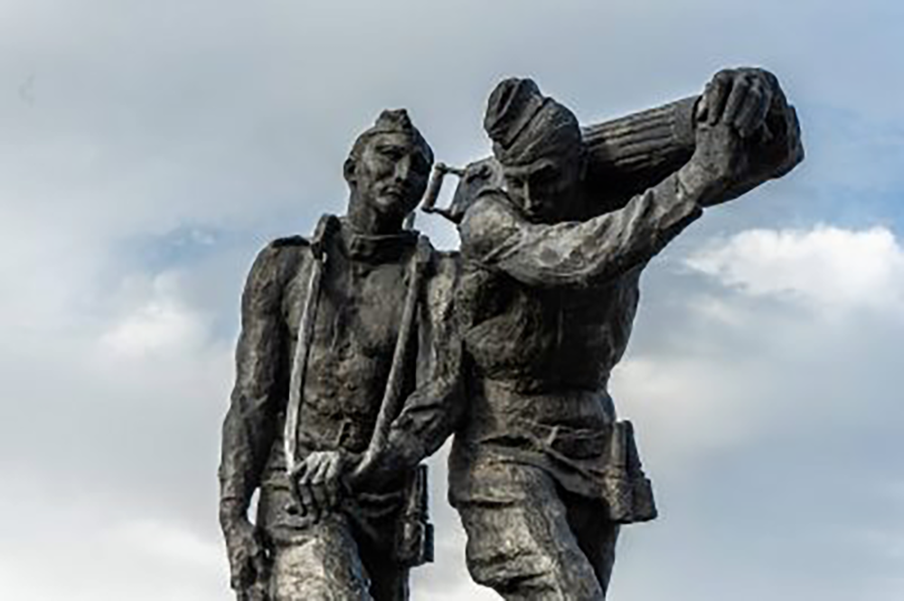 Soviet statue by war memorial in Bishkek